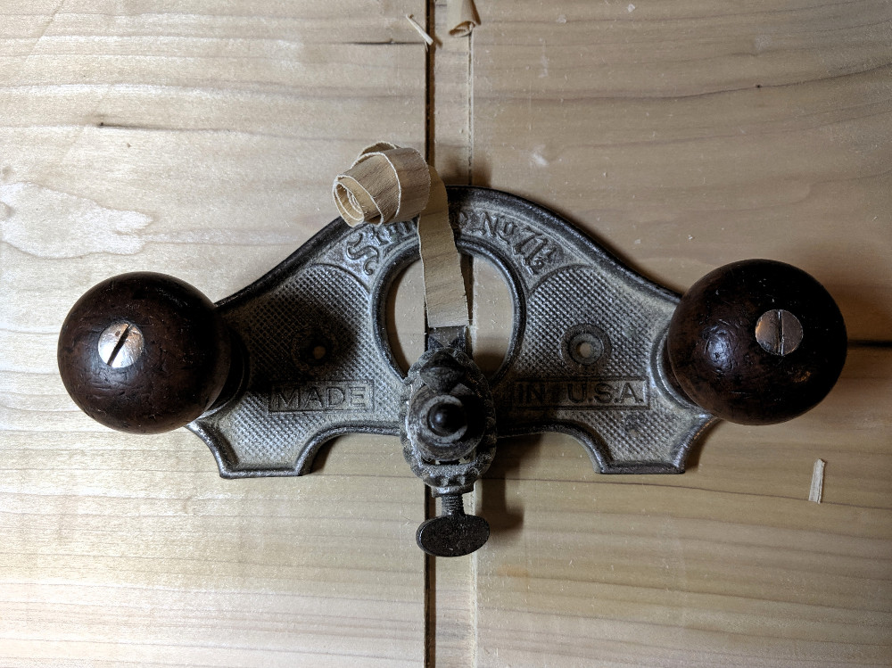 stanley router plane cutting a dado